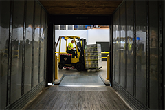 shipping container and forklift